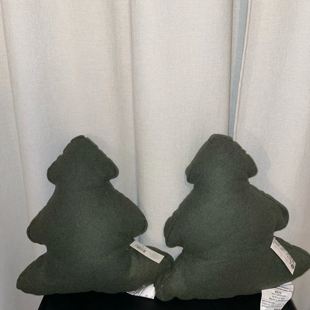 Two green Christmas tree pillows -target bullseye section